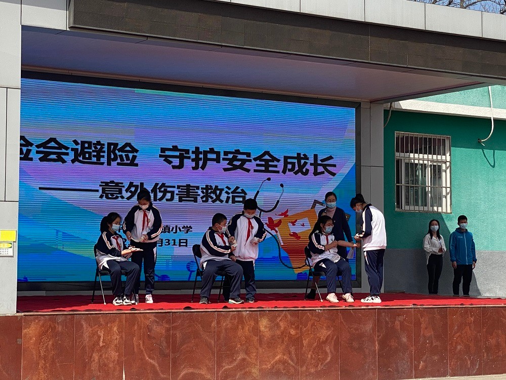 筑牢校园安全防线南口镇小学实战演练